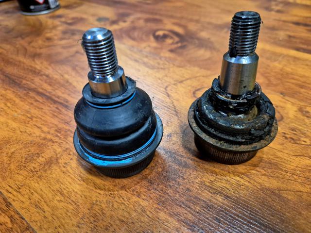Comparison of old and new Mercedes W126 front suspension ball joints